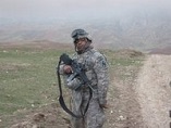 Lenny standing in Afghanistan mountains